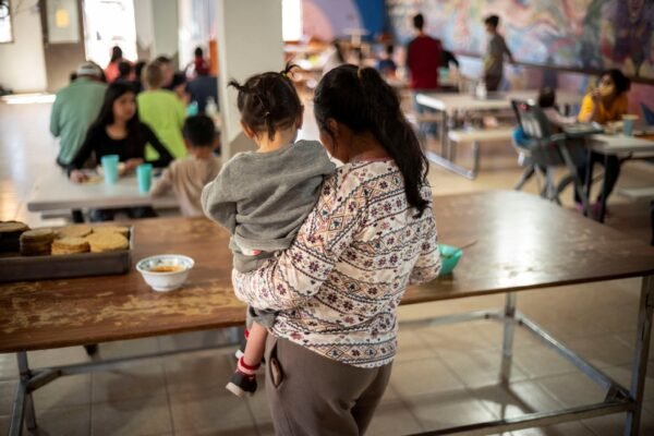 Trump administration halts funding for legal aid for migrant children PHOTO: Migrants and asylum seekers wait in line to receive lunch at the Casa de la Misericordia y de Todas las Naciones migrant shelter, in Nogales, Sonora, Mexico, Feb. 23, 2025.